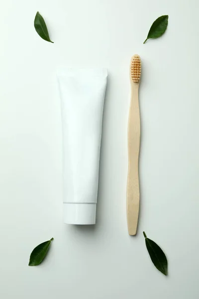 Eco Friendly Toothbrush Tube Toothpaste Leaves White Background — Stock Photo, Image