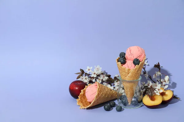 Concept of fruit ice cream on violet background