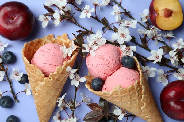 Concept of fruit ice cream on violet background