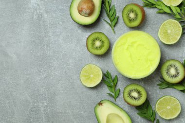 Gri dokulu arka planda cilt bakım konsepti