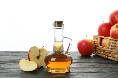 Homemade apple vinegar isolated on white background