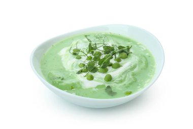 Beyaz zemin üzerinde izole edilmiş bezelye çorbası tabağı