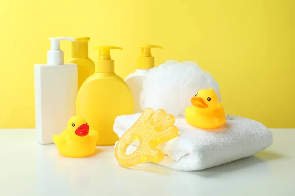 Different Baby Hygiene Accessories Yellow Background — Stockfoto