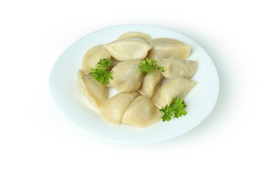 Beyaz zemin üzerinde izole edilmiş vareniki ya da pierogi tabakası