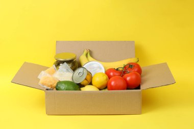 Concept of donate with donation box on table