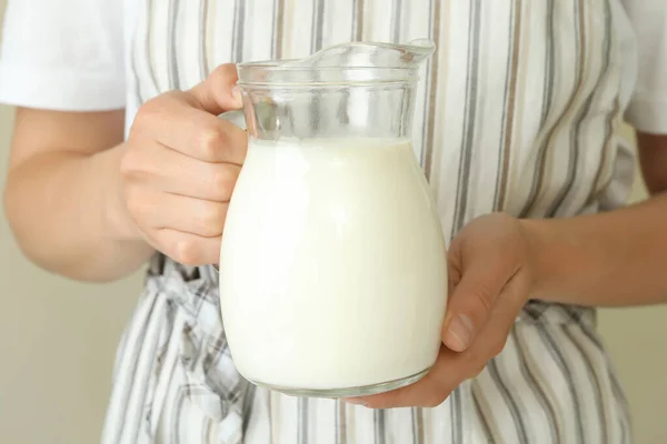 Woman Apron Holds Pitcher Milk Close — Stock Photo, Image