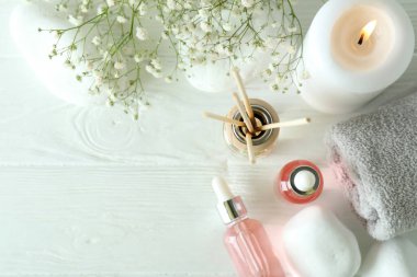 Aromatic concept with diffuser on white wooden table