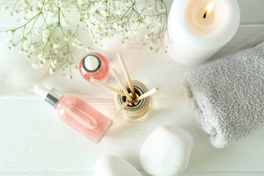 Aromatic concept with diffuser on white wooden table