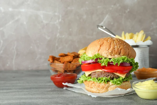 Tasty Fast Food Gray Textured Table — Stock Photo, Image