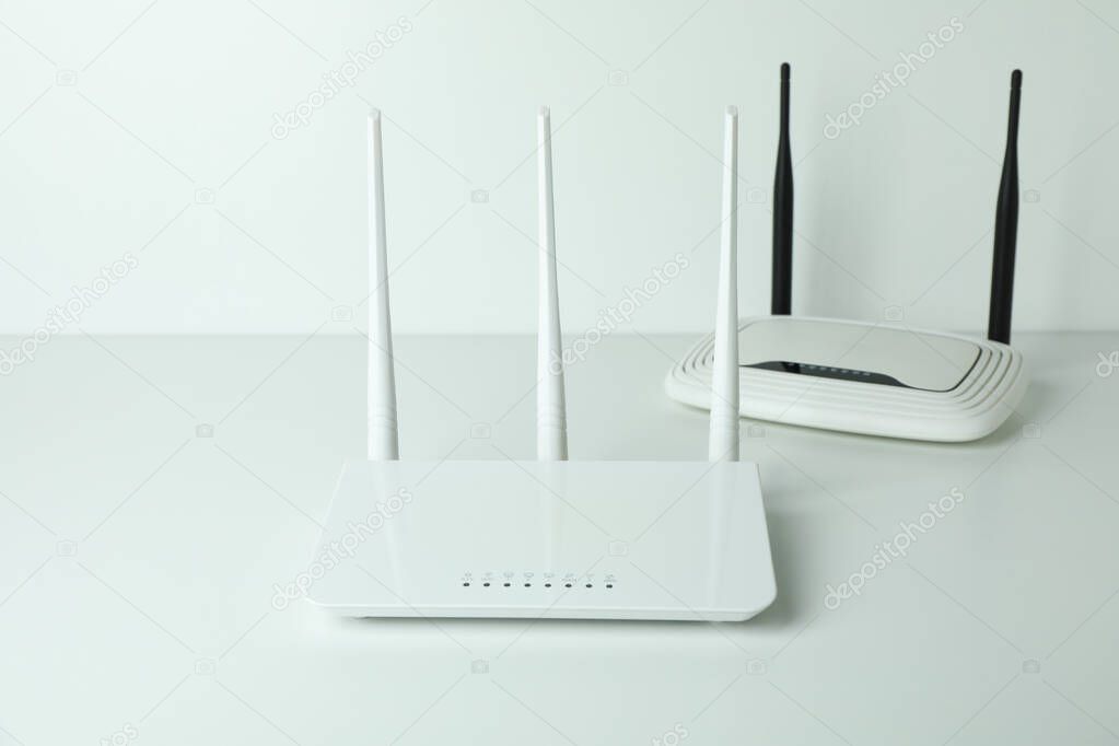 Wi-Fi routers with external antennas on white background