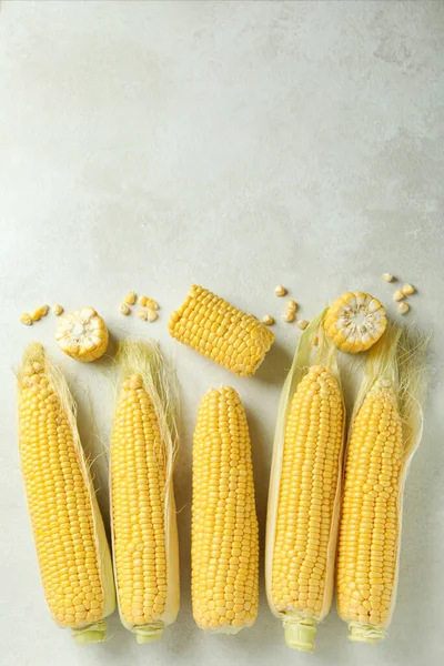Fresh Raw Corn White Textured Background Top View — Stock Photo, Image