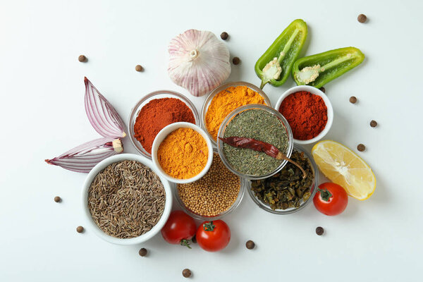 Concept of aromatic spices on white background