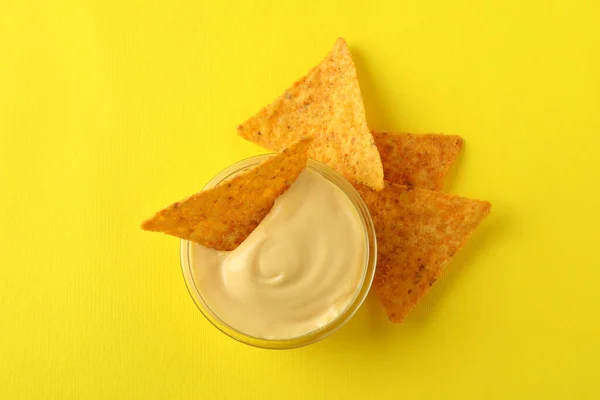 Bowl Cheese Sauce Chips Yellow Background — Stock Photo, Image