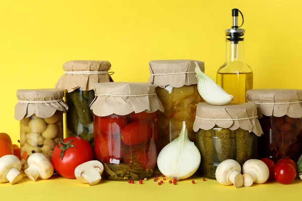 Jars Pickled Vegetables Ingredients Yellow Background — Stock Photo, Image