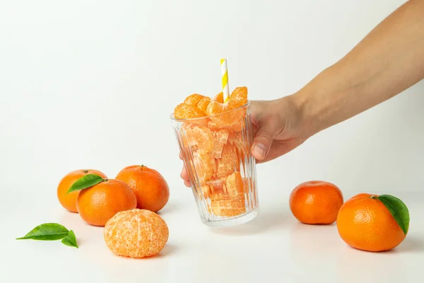 Female Hand Holds Glass Mandarin Slices White Background — Stock Photo, Image