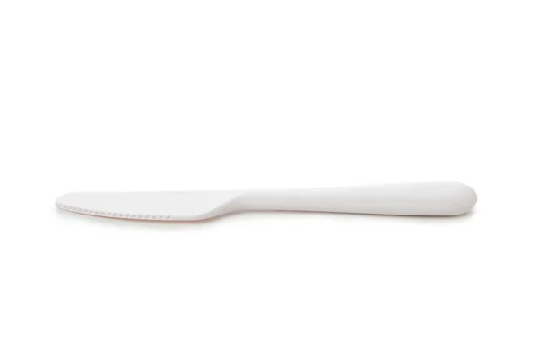 白色背景下隔离的单面塑料刀 — 图库照片