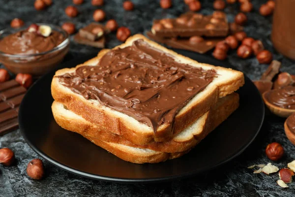 Концепция Вкусной Еды Шоколадной Пастой Черном Фоне — стоковое фото