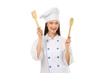 Şef keyifle spatula ve kaşıkla poz veriyor, beyaz üzerine izole edilmiş, PNG