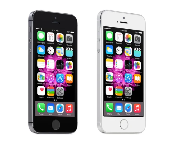 Apple Space Gray and Silver iPhone 5S displaying iOS 8, designed — Stock Photo, Image