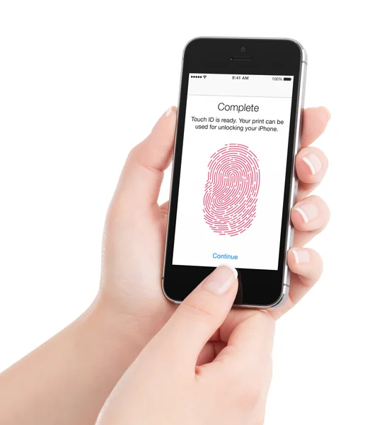 Apple Space Gray iPhone 5S with touch id fingerprint scanning in — Stock Photo, Image