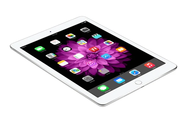 Apple Silver iPad Air 2 with iOS 8 lies on the surface, designed — Stock Photo, Image