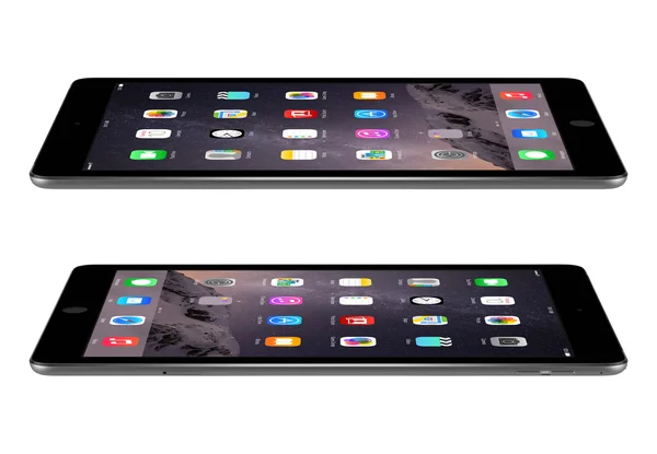 Apple Space Gray iPad Air 2 with iOS 8 lies on the surface, desi — Stock Photo, Image