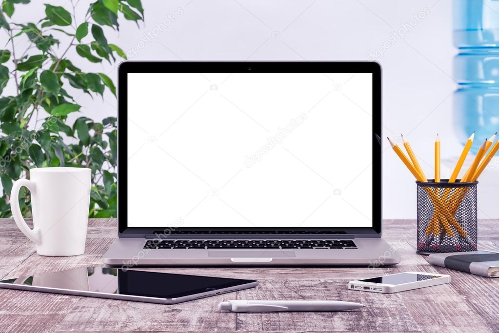 Office workplace with open laptop mockup tablet computer