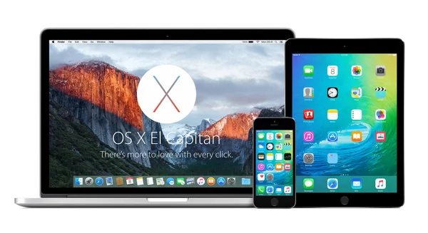 Apple Macbook z Os X El Capitan i iphone ipad z ios 9 — Zdjęcie stockowe