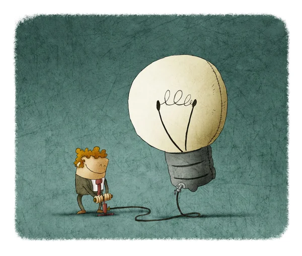 Smiling man inflating bulb — Stock Photo, Image