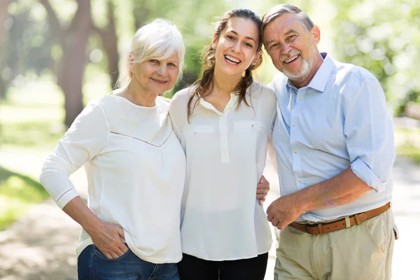 Senior Couple with Daughter in the Park — Stock Photo, Image