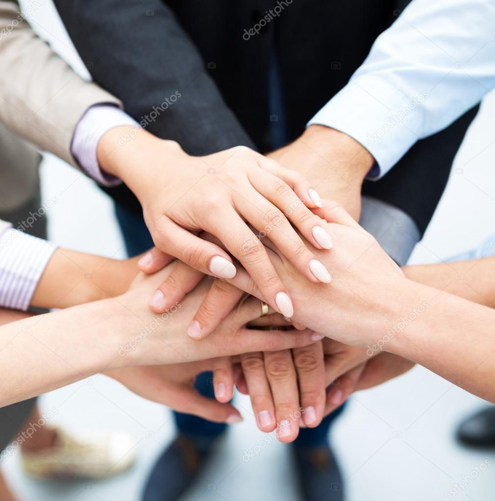 Businesspeople Stacking Hands — Stock Photo © pikselstock 54797069