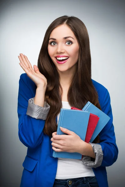 Kvinnlig student anläggning böcker — Stockfoto