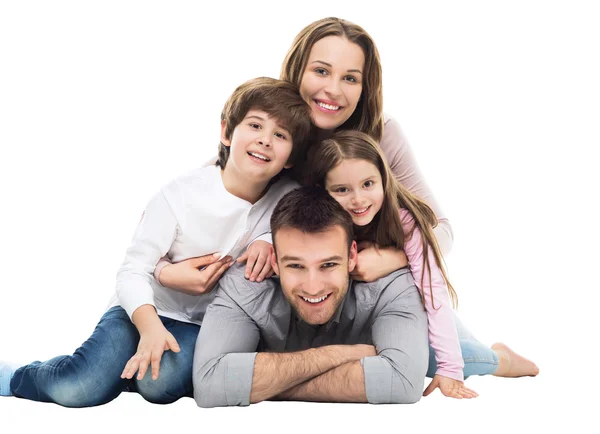 Família feliz com crianças pequenas — Fotografia de Stock