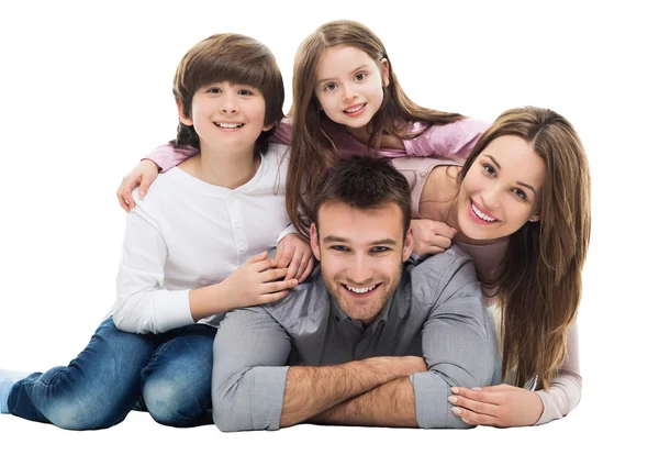 Família feliz com crianças pequenas — Fotografia de Stock