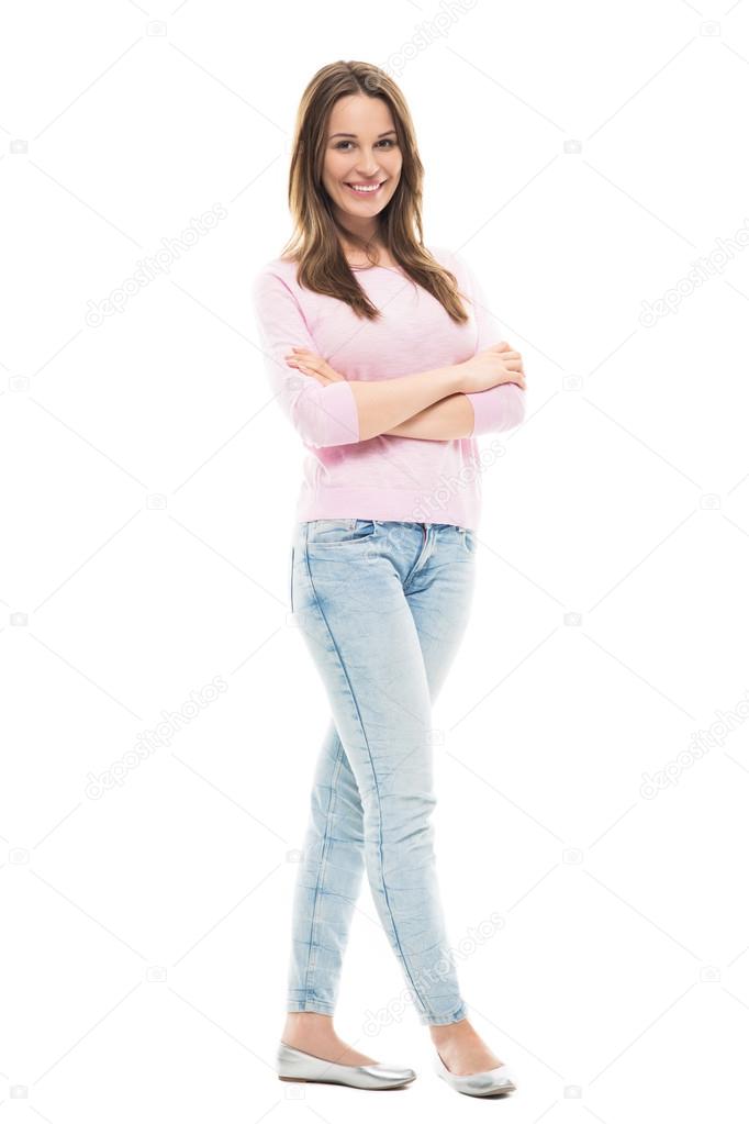 Young woman standing with crossed hands