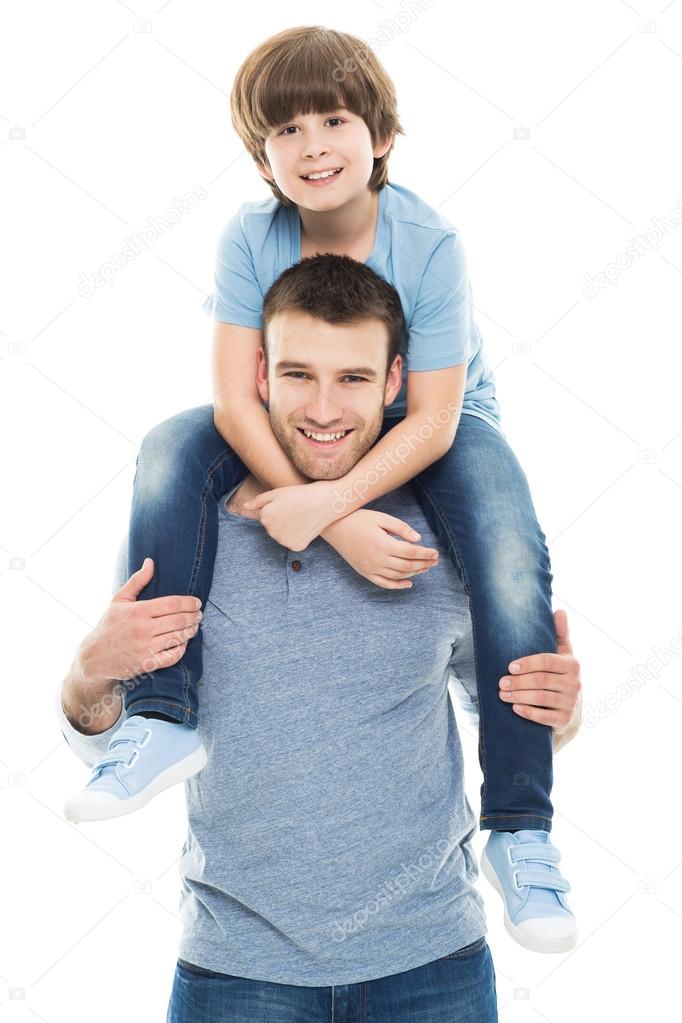 Father giving his son piggyback ride