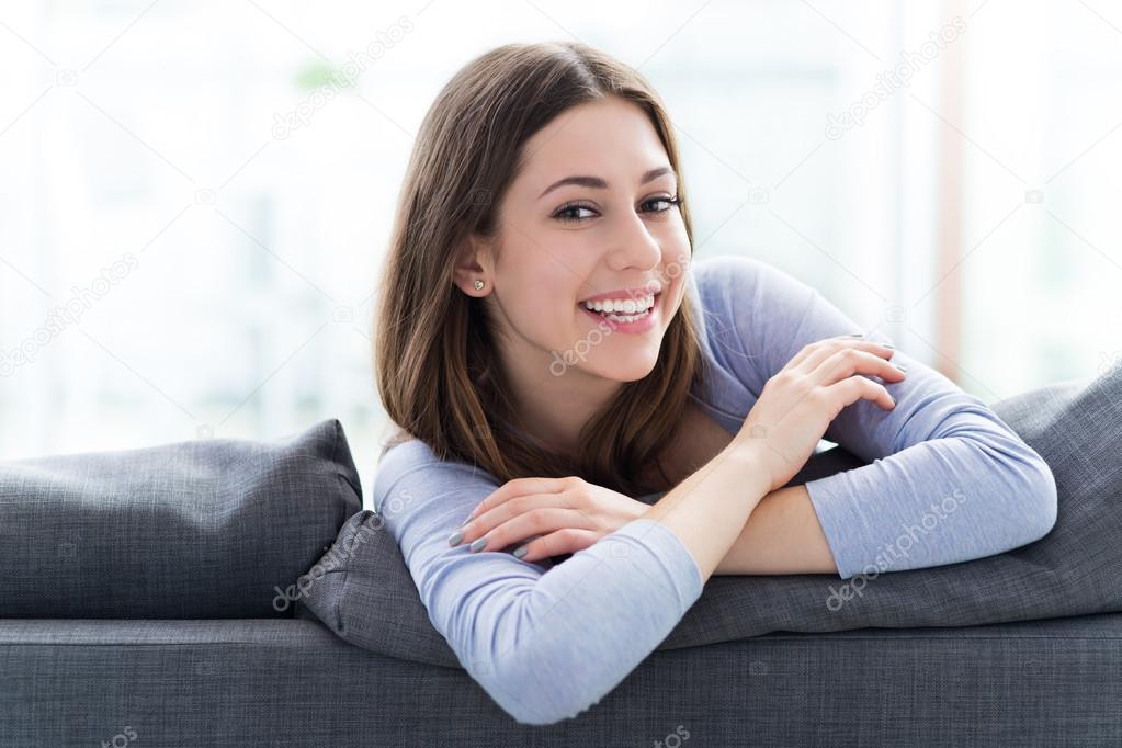 Woman relaxing on sofa