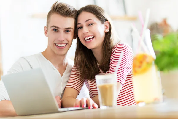 Young couple at cafe — Stock Photo, Image