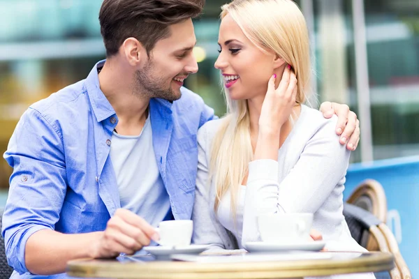 Young couple at cafe — Stock Photo, Image