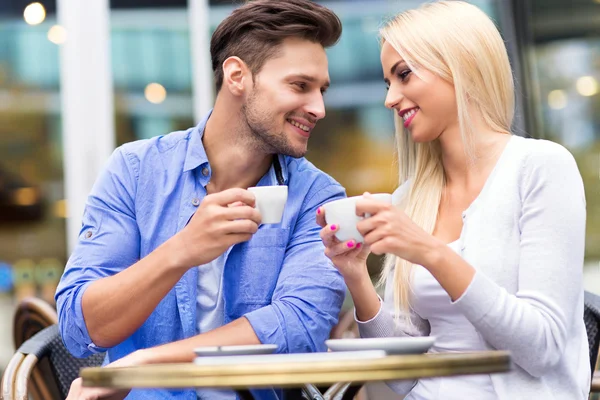 Young couple at cafe — Stock Photo, Image