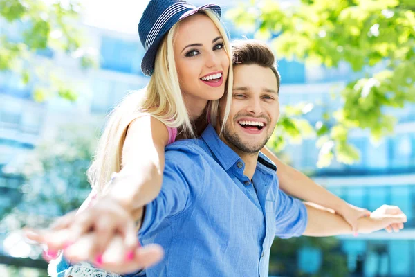 Happy young couple outdoors — Stock Photo, Image