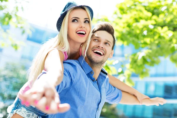 Happy young couple outdoors — Stock Photo, Image