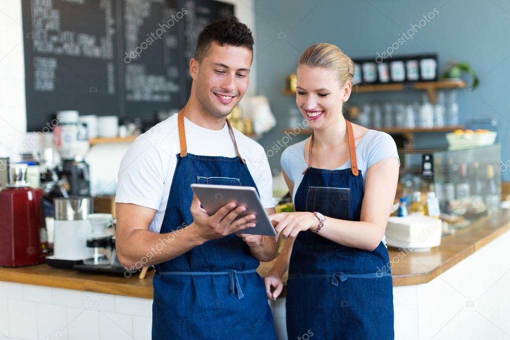 Small business owners in coffee shop