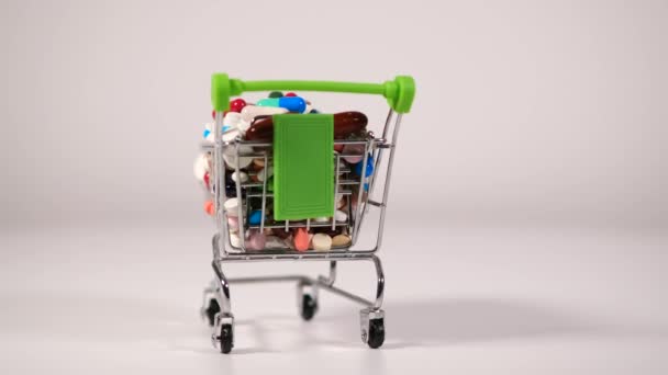 Metal Decorative Small Shopping Cart Green Handles Rotates White Background — Stock Video