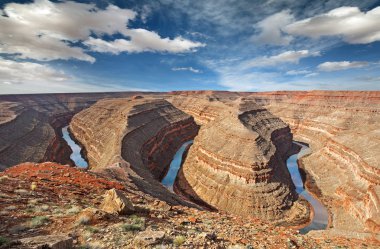 panoramic view of river bends in goosenecks state park clipart