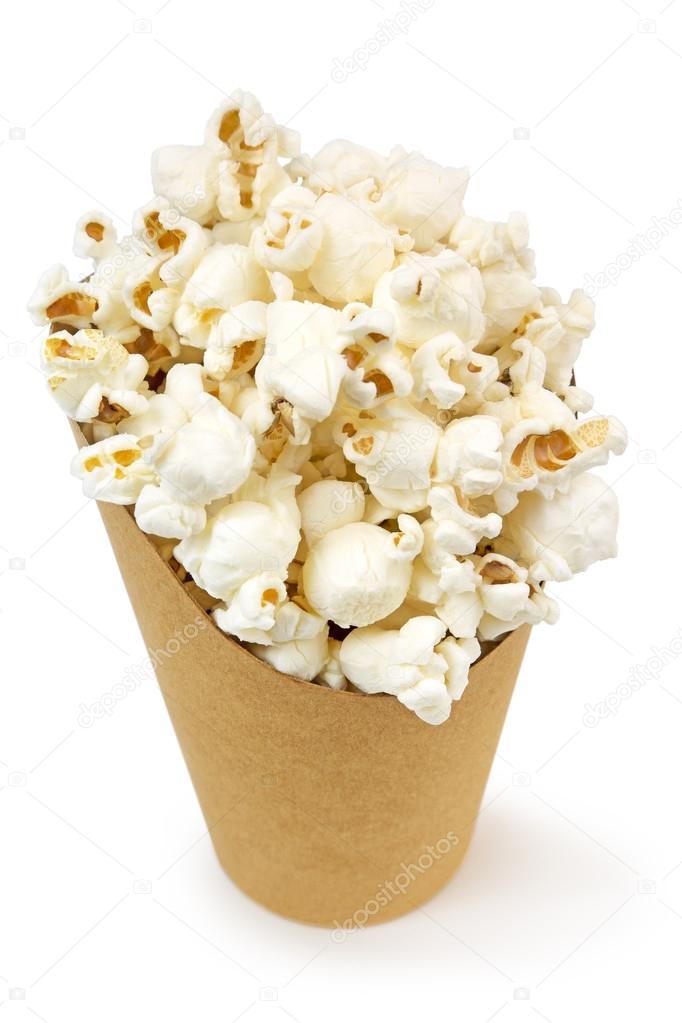 cardboard bucket full of popcorn isolated on white