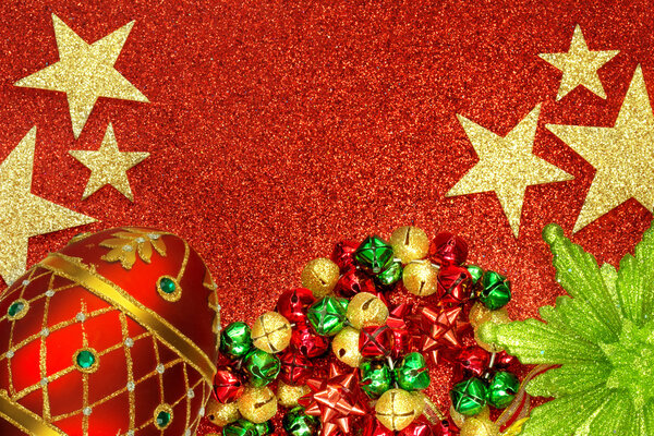 Christmas tree ornaments on red glitter background