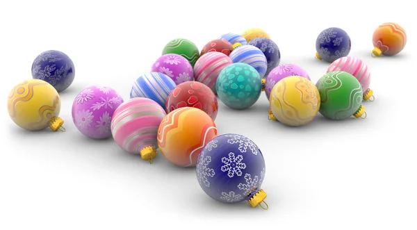 Tas de boules de Noël colorées sur fond blanc — Photo