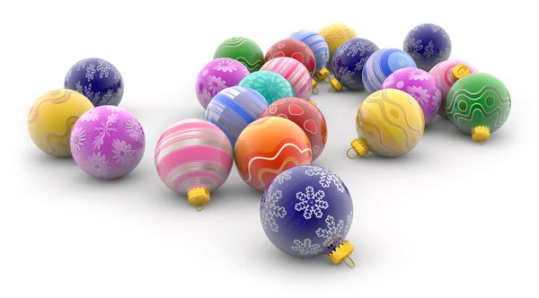 Beyaz arka plan üzerinde renkli Noel baubles yığını — Stok fotoğraf