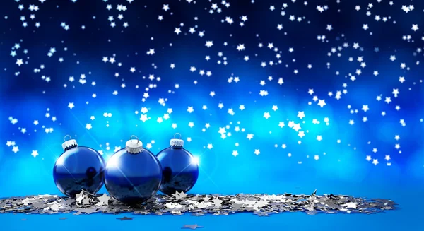 Three christmas balls in a starry background — Stock Photo, Image